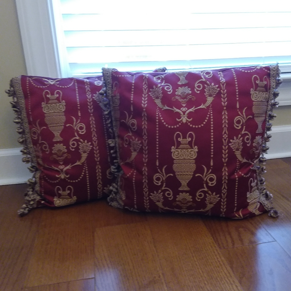 Red and gold decorative throw pillows (2)